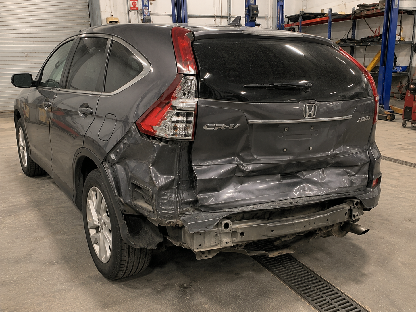 Honda CRV before repair, showing collision damage