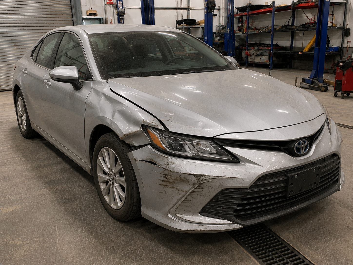 2020 Toyota Camry Hybrid XV70 before repair, showing damage